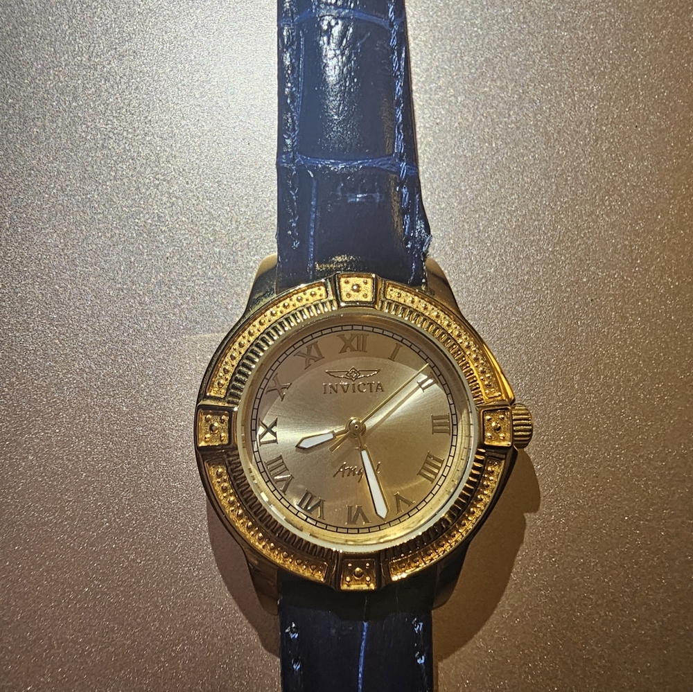 Ladies Invicta Gold Watch with Dark Blue Strap
